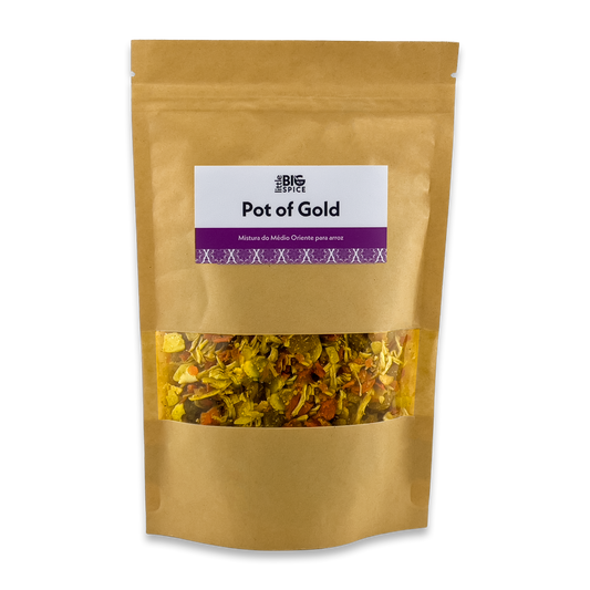 Brown spice bag labeled “Pot of Gold,” with a clear window showing yellow, orange  turmeric-based Middle Eastern rice seasoning mix.
