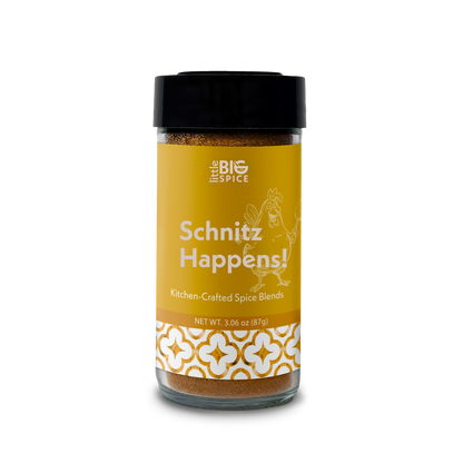 Spice bottle with colored label for “Schnitz Happens!” herby Mediterranean schnitzel spice blend.