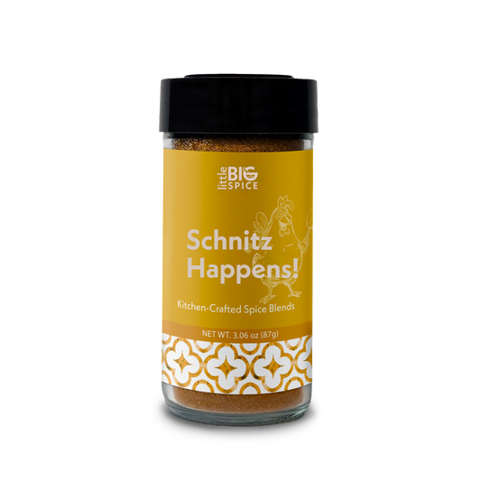 Spice bottle with colored label for “Schnitz Happens!” herby Mediterranean schnitzel spice blend.